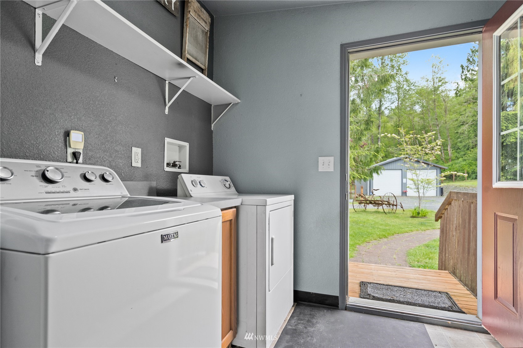 16227 OK Mill Road Snohomish, WA 98290 - Photo 33 of 38 a utility room with dryer and washer