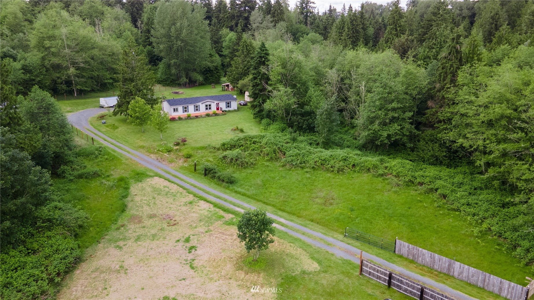 16227 OK Mill Road Snohomish, WA 98290 - Photo 5 of 38 a view of a back yard from a balcony