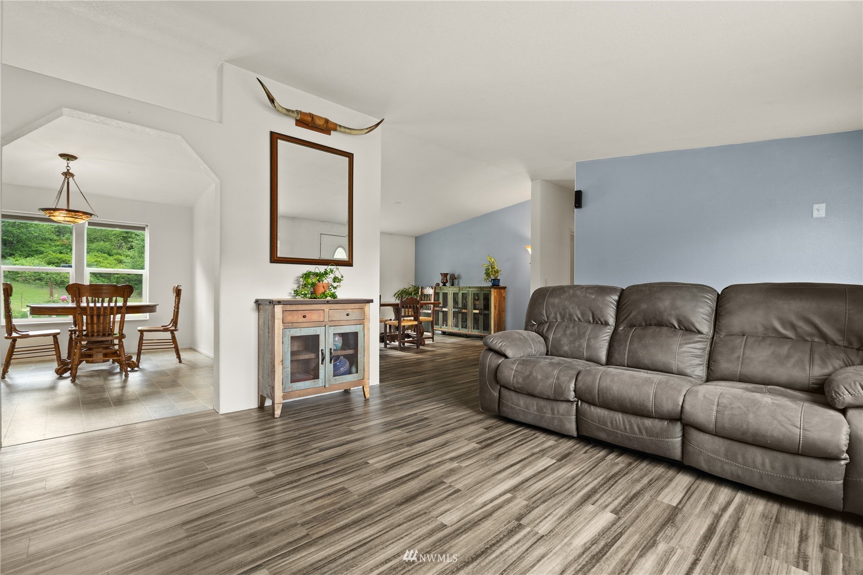 16227 OK Mill Road Snohomish, WA 98290 - Photo 8 of 38 a living room with furniture and a fireplace