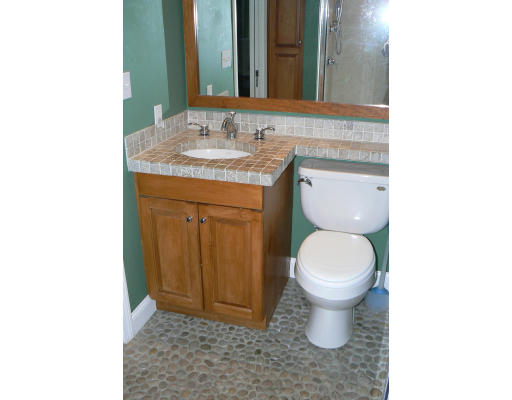 35 Colgate Road Newton, MA 02462 - Photo 11 of 17 a bathroom with a toilet sink and mirror