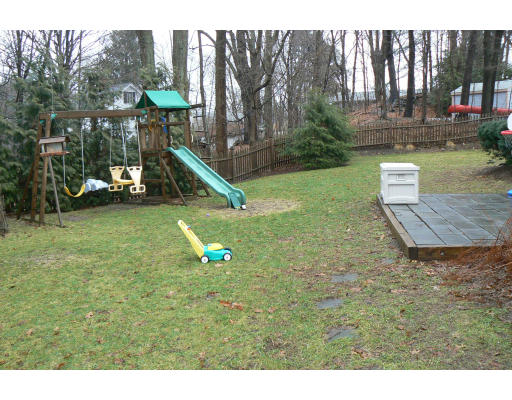 35 Colgate Road Newton, MA 02462 - Photo 16 of 17 a view of a garden with a slide