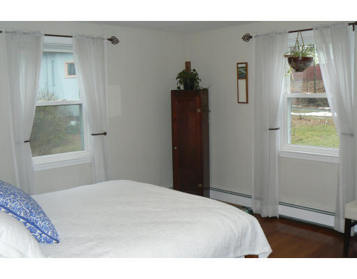 35 Colgate Road Newton, MA 02462 - Photo 9 of 17 a bedroom with a bed and a window