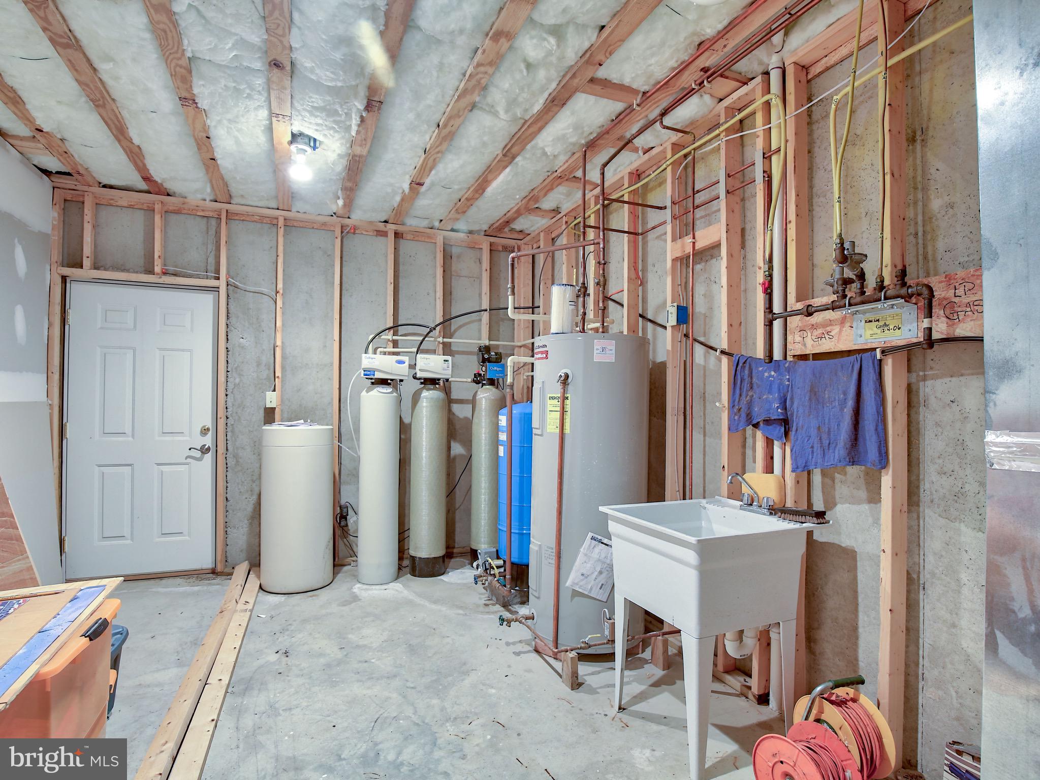461 Fletcher Road Gore, VA 22637 - Photo 40 of 51 Utility room in basement (Water treatment system)