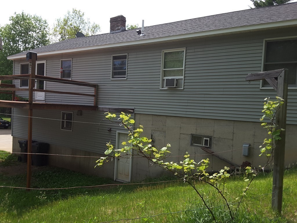 42 Cummings Road Ware, MA 01082 - Photo 9 of 28 a front view of a house with a yard