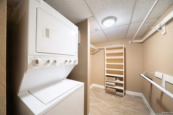 a view of kitchen with furniture and window