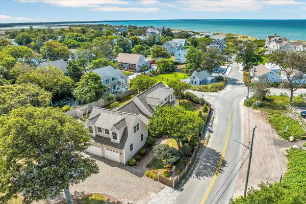 an aerial view of a house with a garden