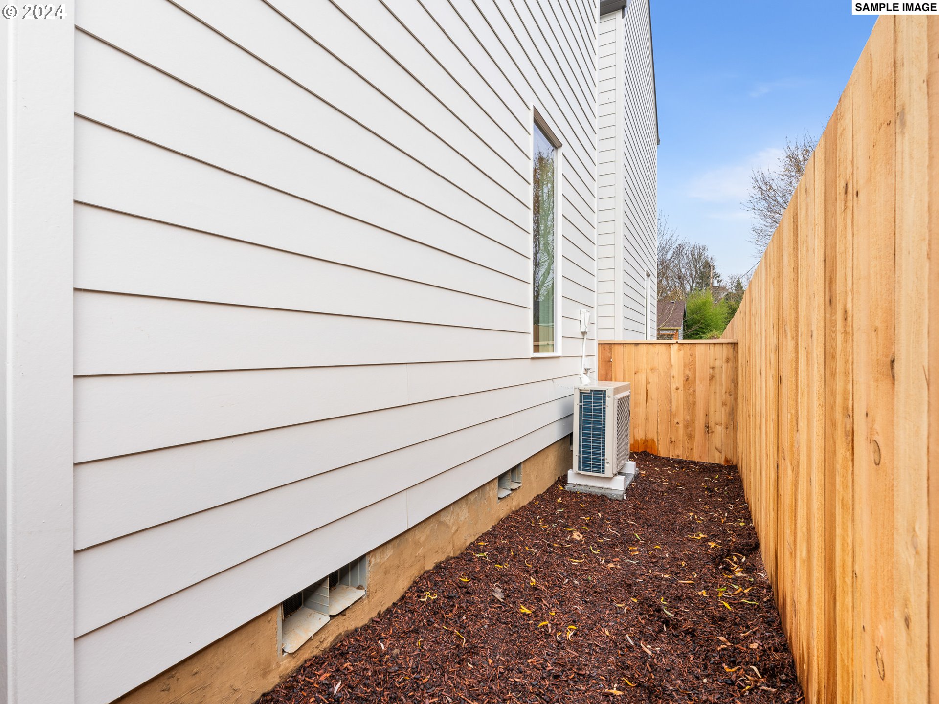 6195 North Amherst Street Portland, OR 97203 - Photo 13 of 20 a house view with a backyard