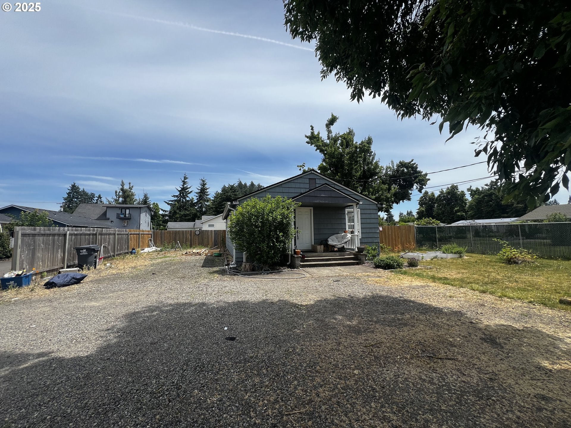 2343 31st Street Springfield, OR 97477 - Photo 2 of 12 a view of a house with swimming pool and sitting area