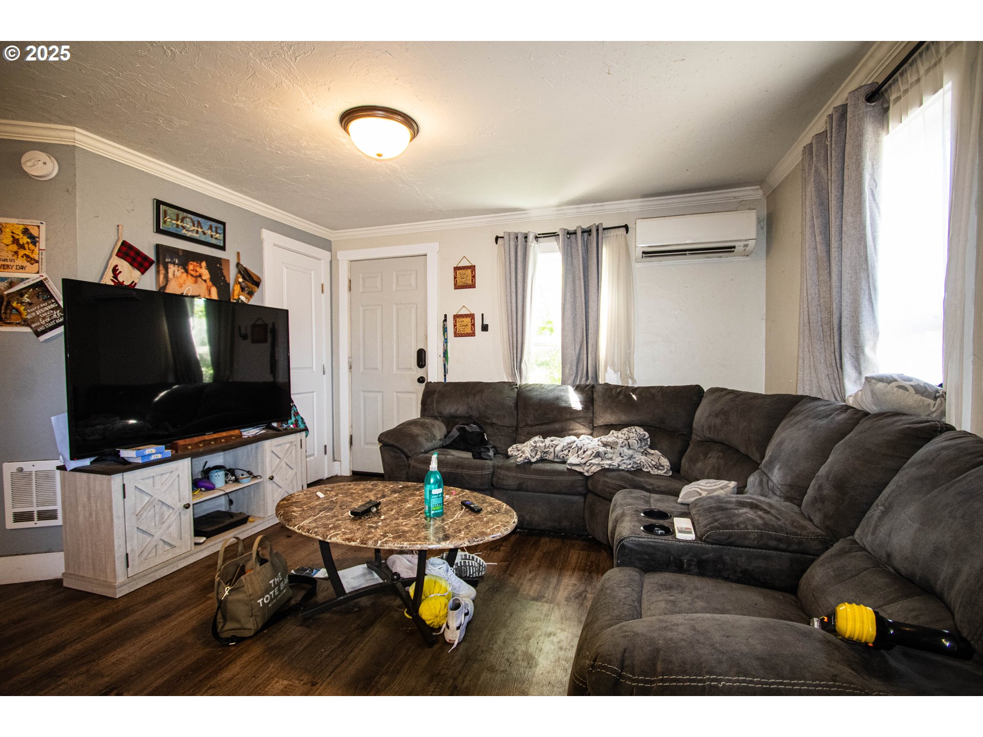 2343 31st Street Springfield, OR 97477 - Photo 4 of 12 a living room with furniture and a flat screen tv