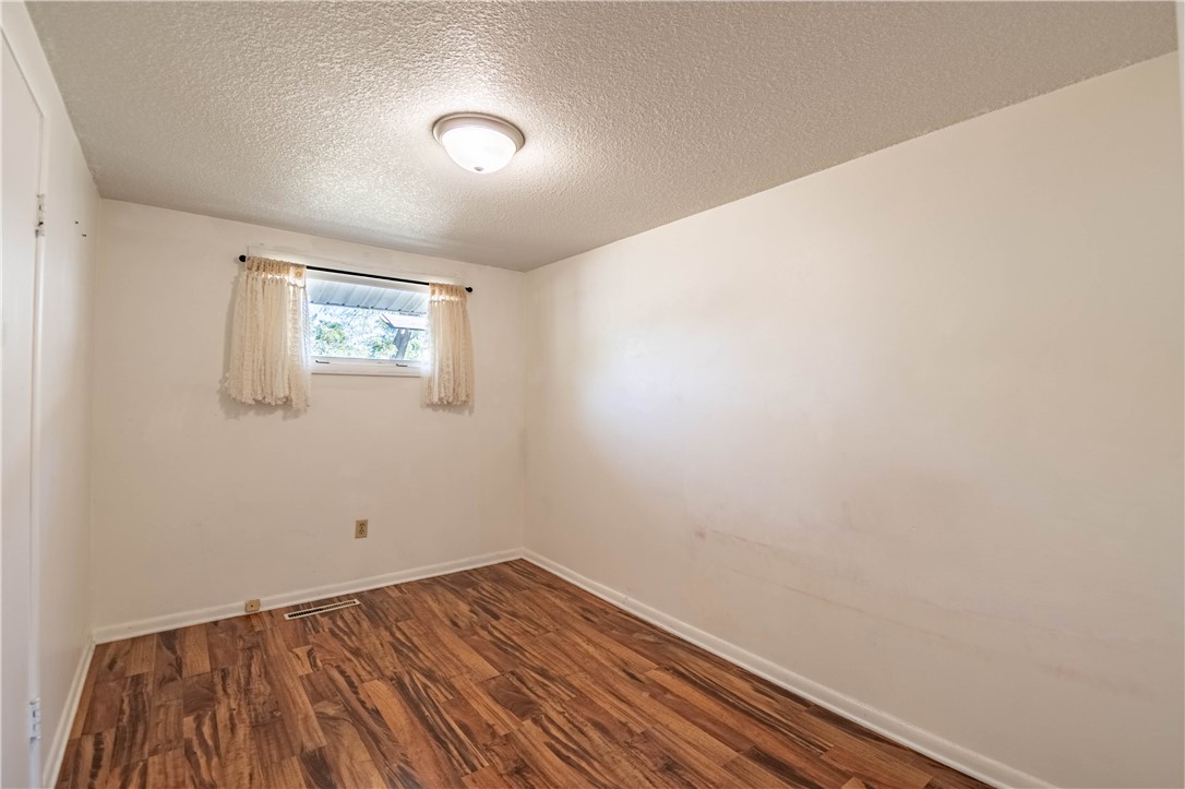 4016 Bayview Drive Decatur, IL 62521 - Photo 8 of 15 a view of room with wooden floor and fan
