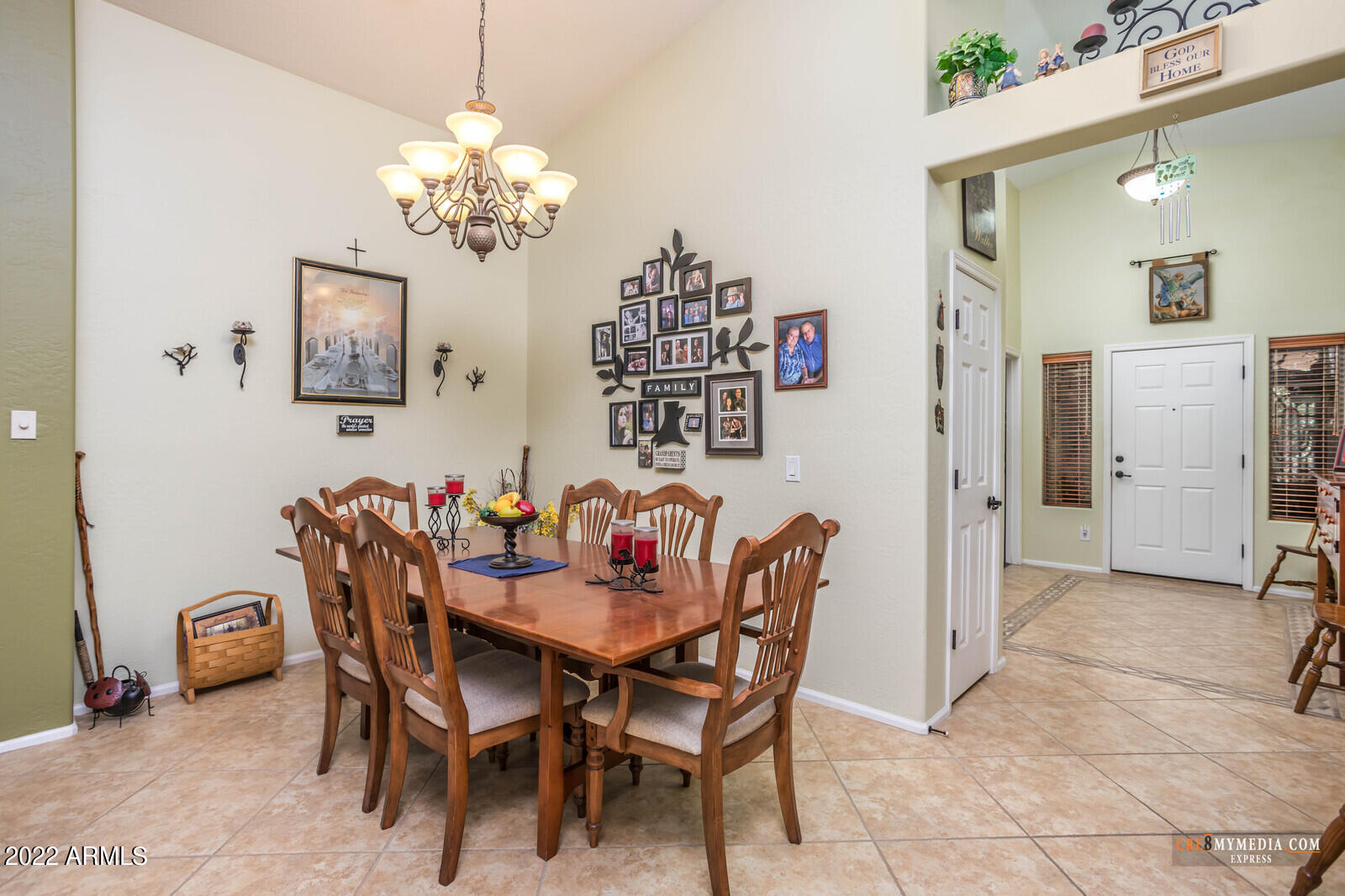 45083 West Norris Road Maricopa, AZ 85139 - Photo 12 of 35 a dining room with furniture and chandelier
