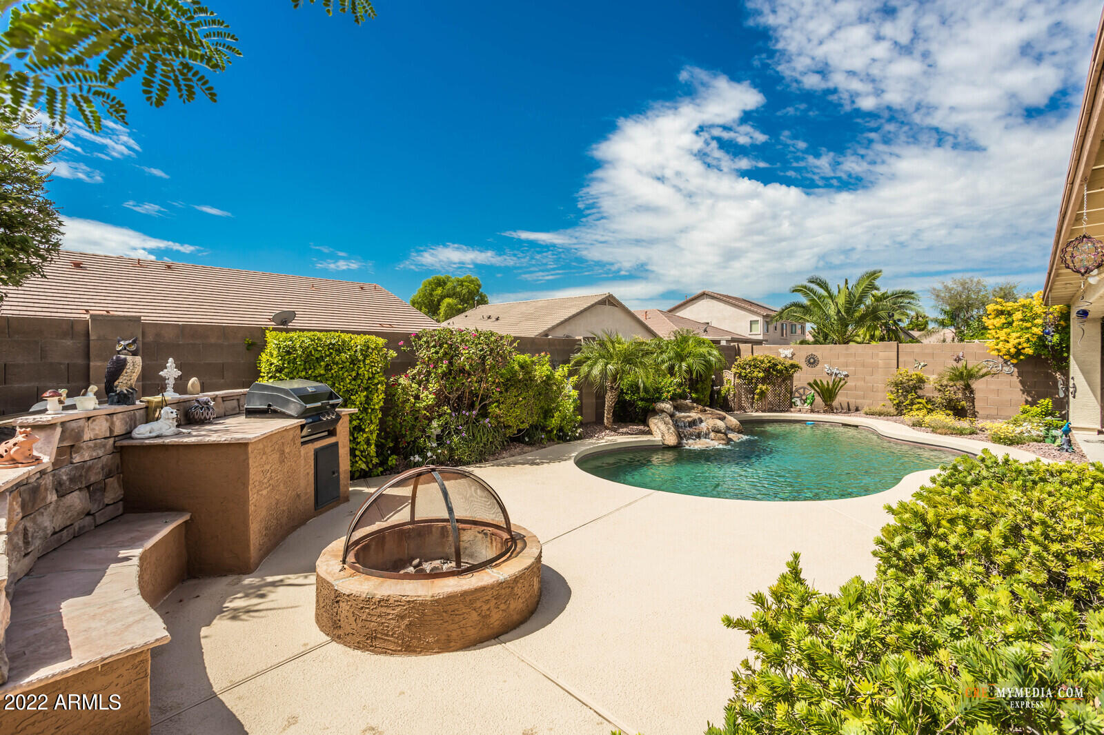 45083 West Norris Road Maricopa, AZ 85139 - Photo 2 of 35 a view of a swimming pool and outdoor space