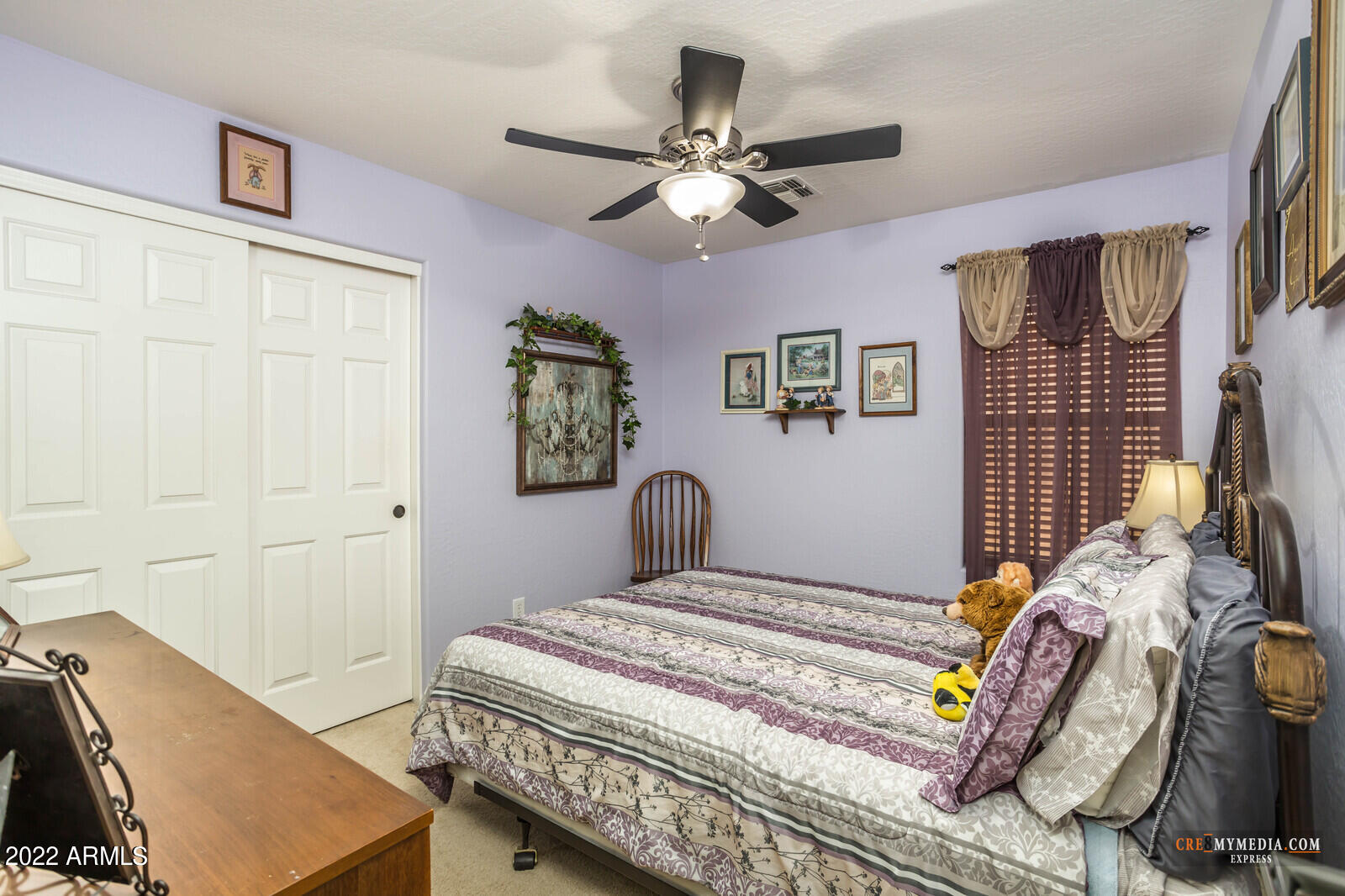 45083 West Norris Road Maricopa, AZ 85139 - Photo 24 of 35 a bedroom with a bed and dresser