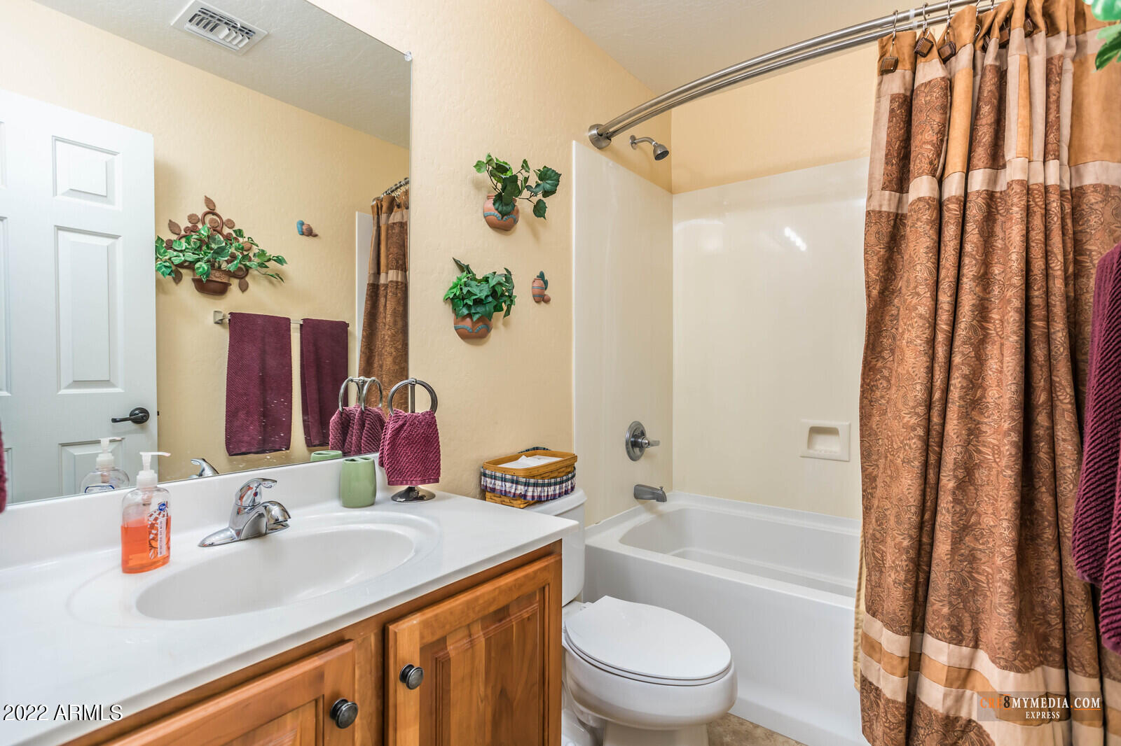 45083 West Norris Road Maricopa, AZ 85139 - Photo 25 of 35 a bathroom with a granite countertop sink toilet and shower