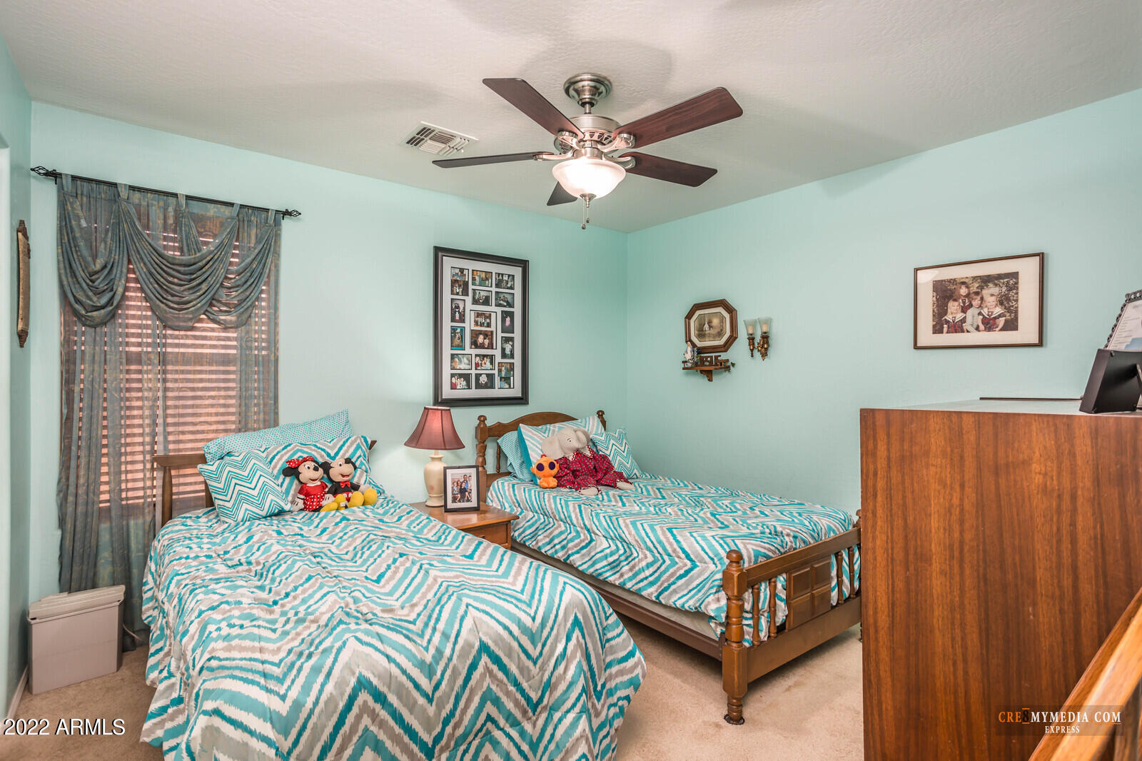45083 West Norris Road Maricopa, AZ 85139 - Photo 26 of 35 a bedroom with a bed and window