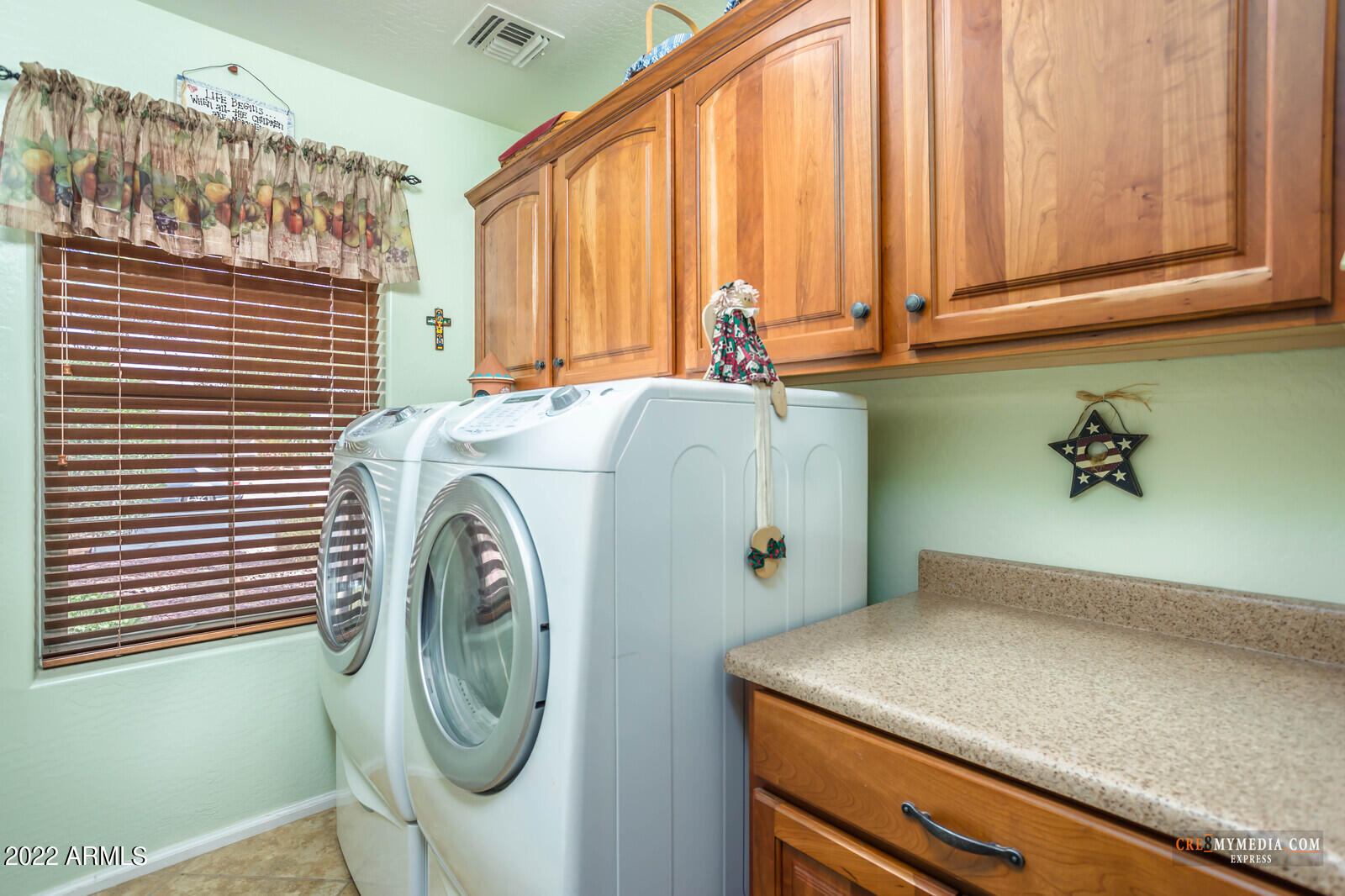 45083 West Norris Road Maricopa, AZ 85139 - Photo 28 of 35 a utility room with dryer and washer