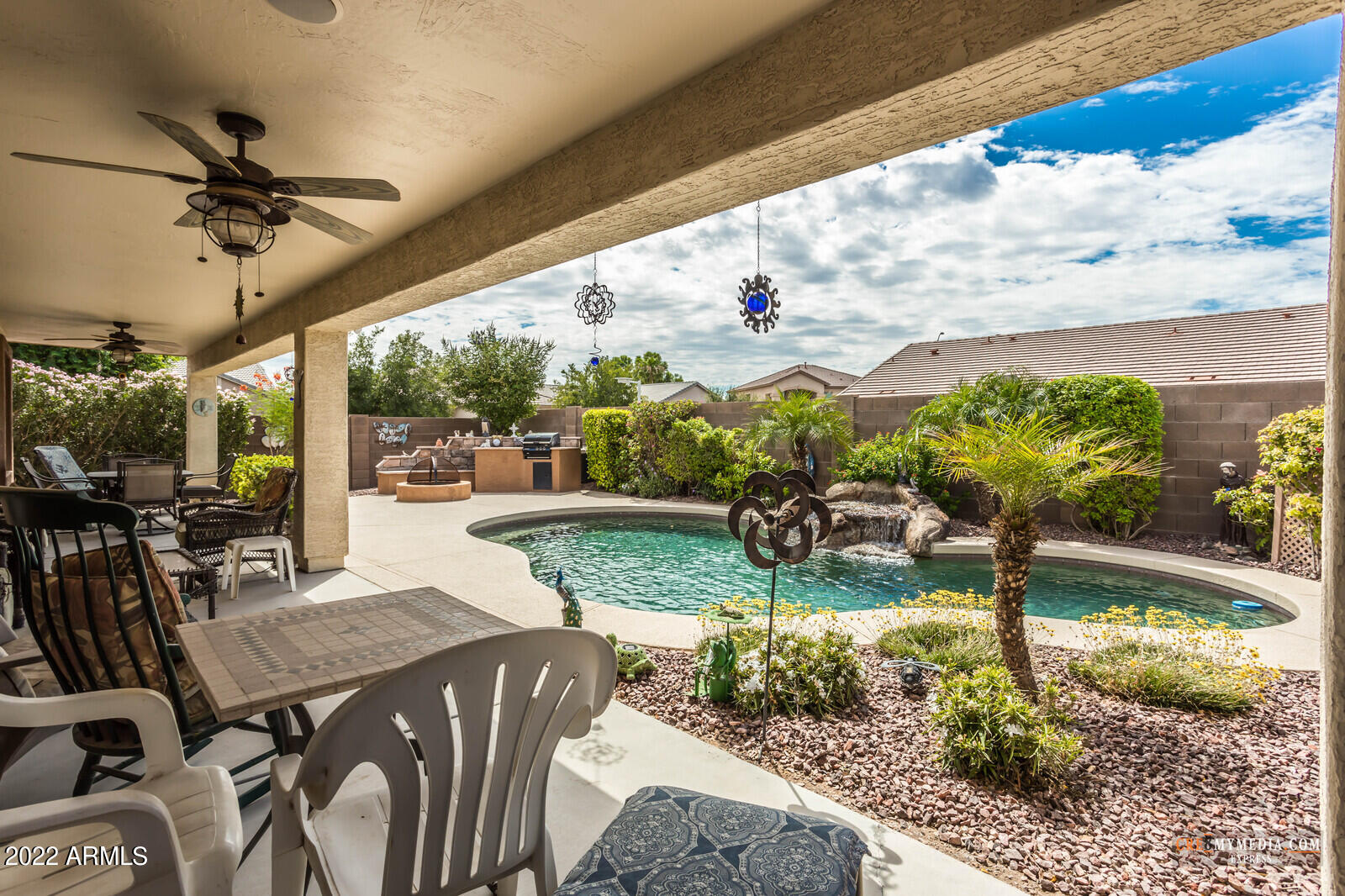 45083 West Norris Road Maricopa, AZ 85139 - Photo 32 of 35 a view of a porch with furniture and yard