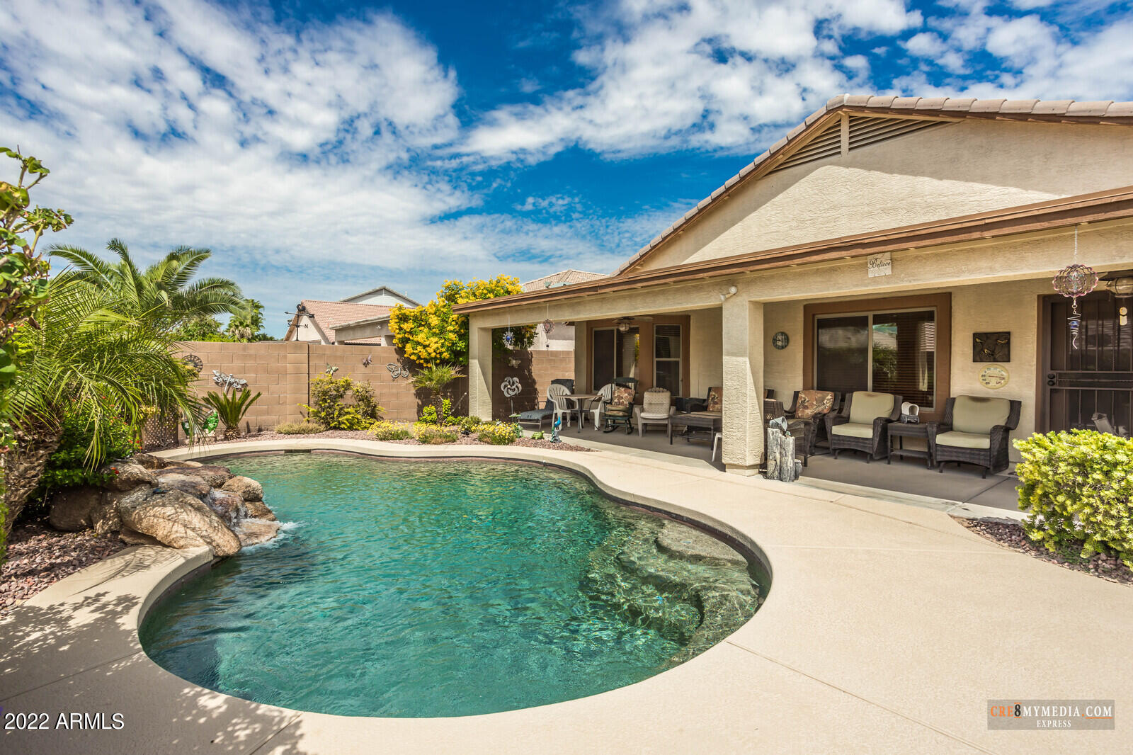 45083 West Norris Road Maricopa, AZ 85139 - Photo 34 of 35 a view of a swimming pool with a patio