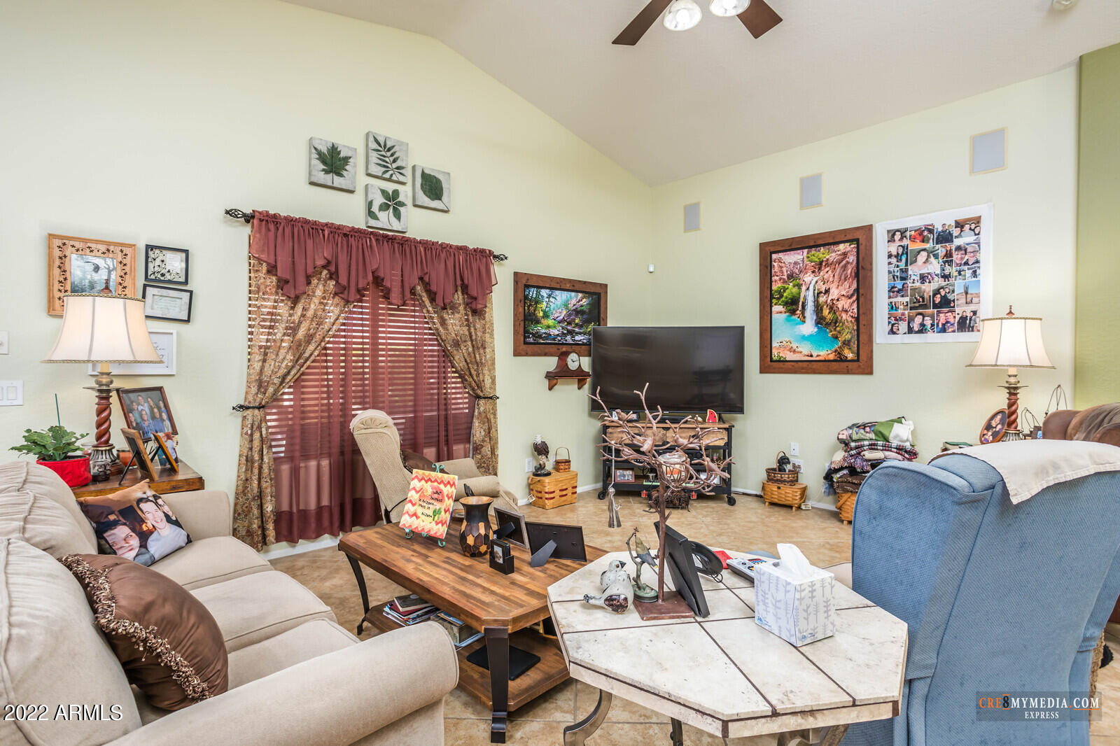 45083 West Norris Road Maricopa, AZ 85139 - Photo 9 of 35 a living room with furniture and a flat screen tv