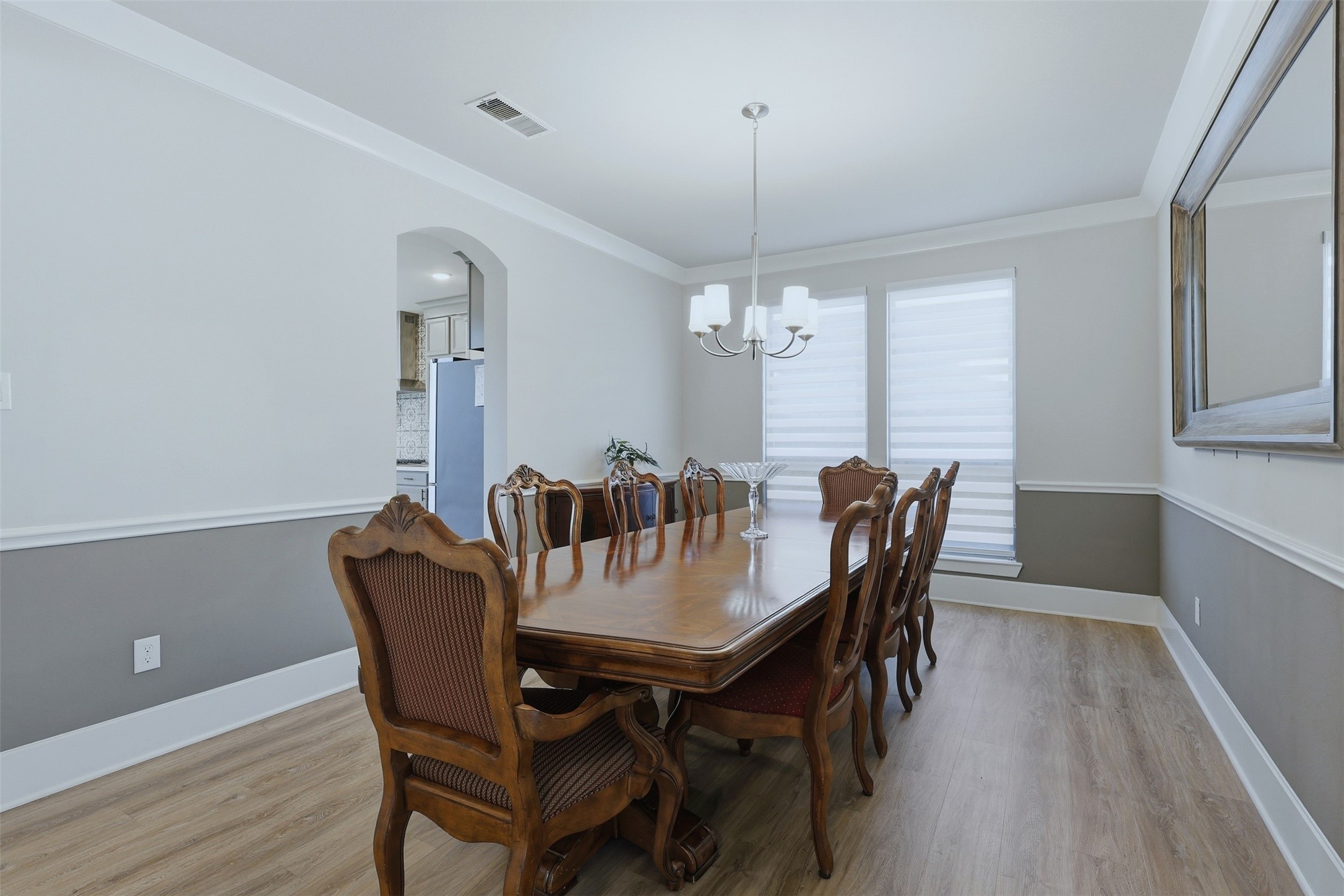 15133 Mahogany Trail Conroe, TX 77302 - Photo 11 of 49 a view of a dining room with furniture window and wooden floor