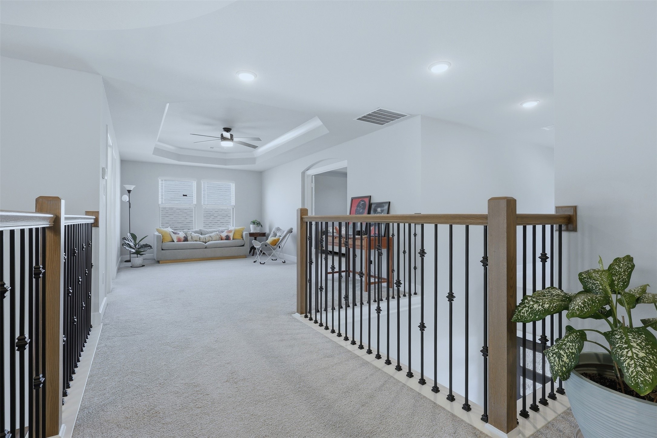 15133 Mahogany Trail Conroe, TX 77302 - Photo 26 of 49 a view of a hallway with workspace and livingroom view