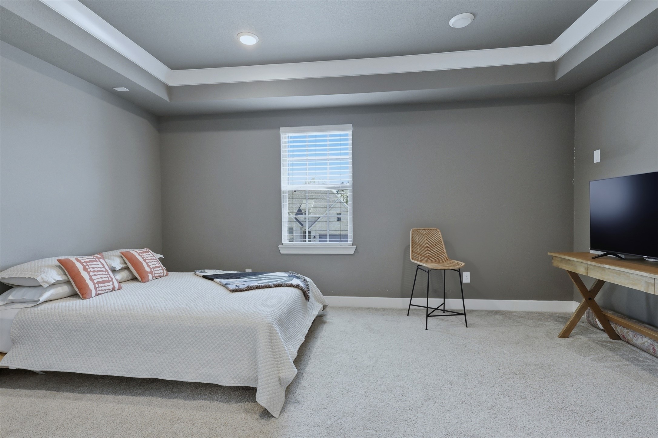 15133 Mahogany Trail Conroe, TX 77302 - Photo 28 of 49 a bedroom with a bed and a chair
