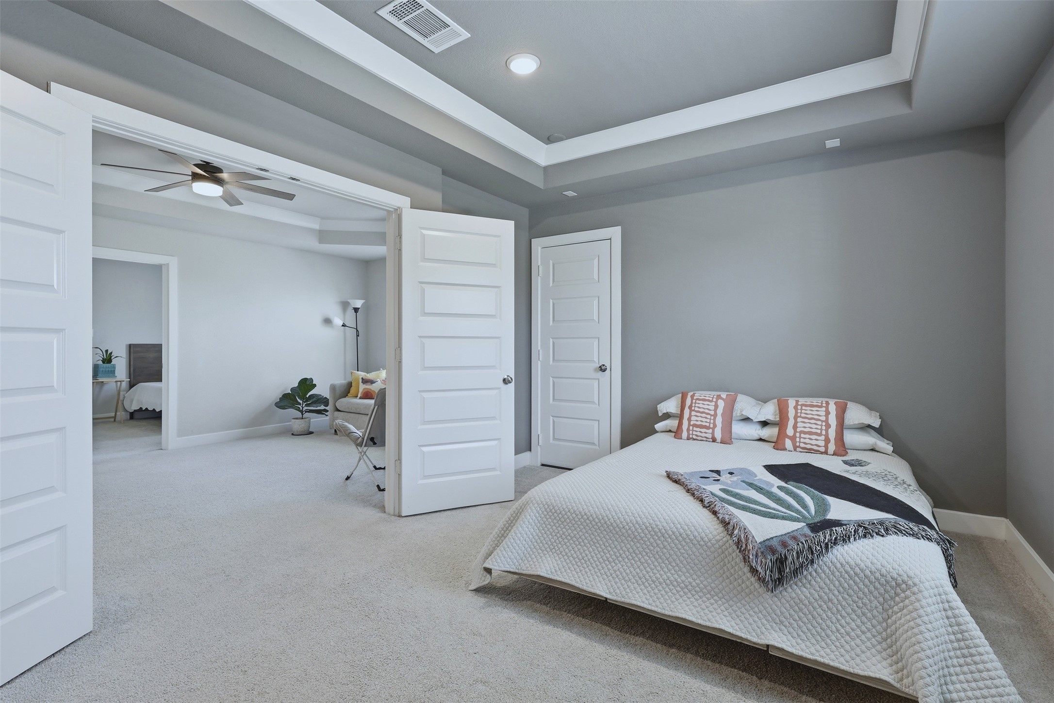 15133 Mahogany Trail Conroe, TX 77302 - Photo 29 of 49 a bedroom with a bed and cabinets