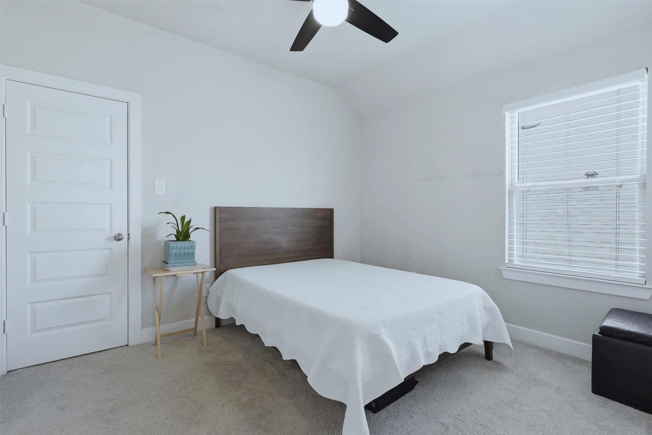 15133 Mahogany Trail Conroe, TX 77302 - Photo 31 of 49 a bedroom with a bed and a window