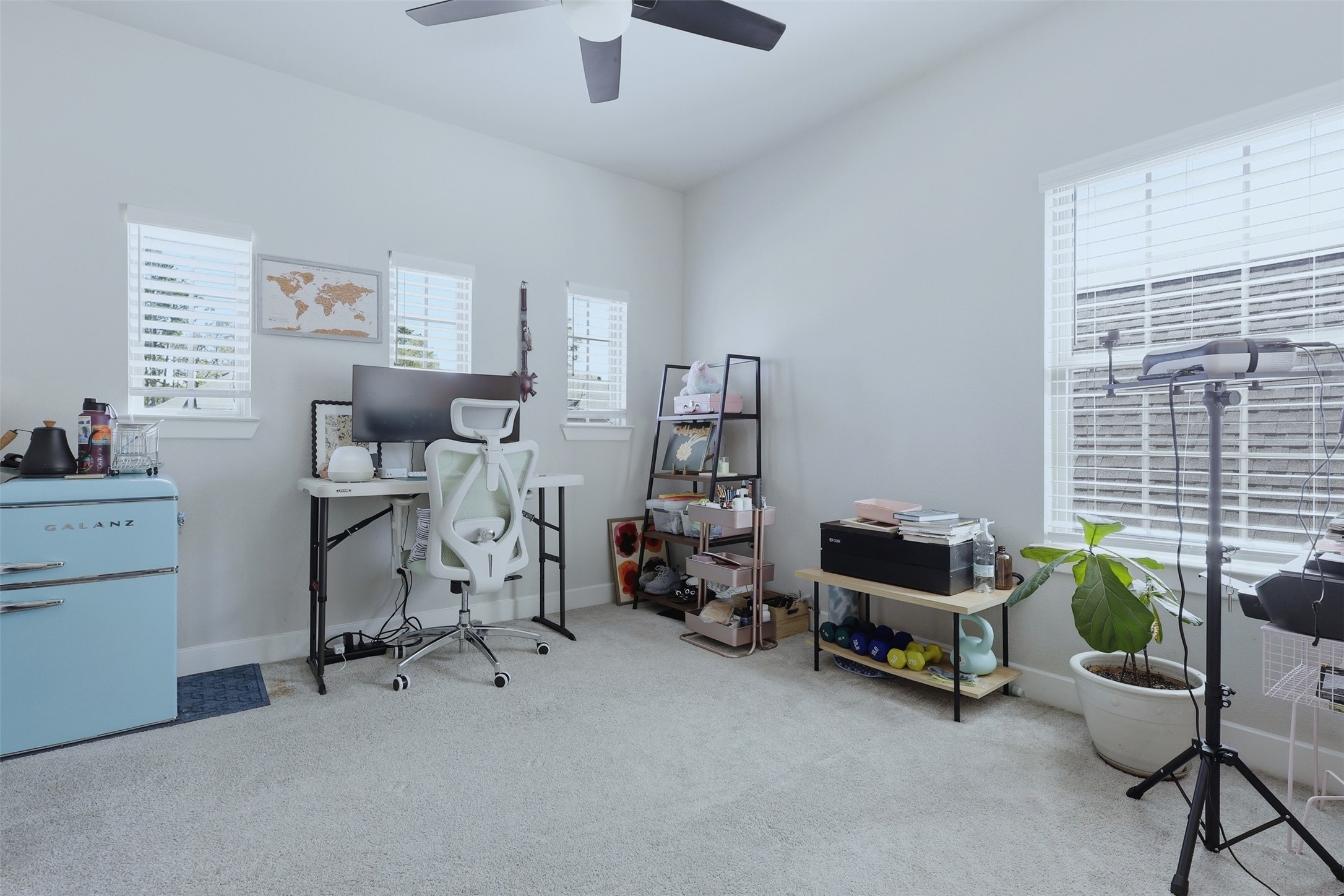 15133 Mahogany Trail Conroe, TX 77302 - Photo 32 of 49 a view of a workspace with furniture and a window