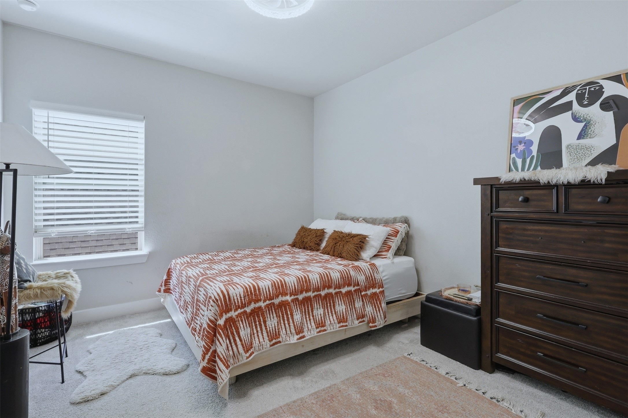 15133 Mahogany Trail Conroe, TX 77302 - Photo 34 of 49 a bedroom with a bed and window