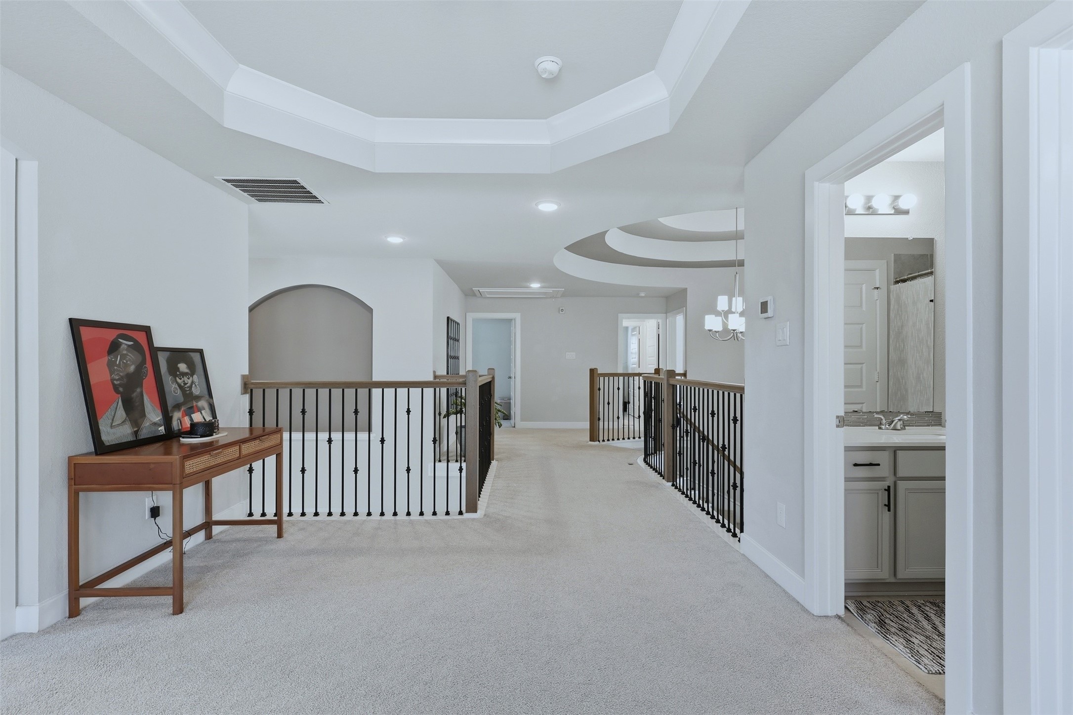 15133 Mahogany Trail Conroe, TX 77302 - Photo 35 of 49 a view of a hallway with dining room and stairs