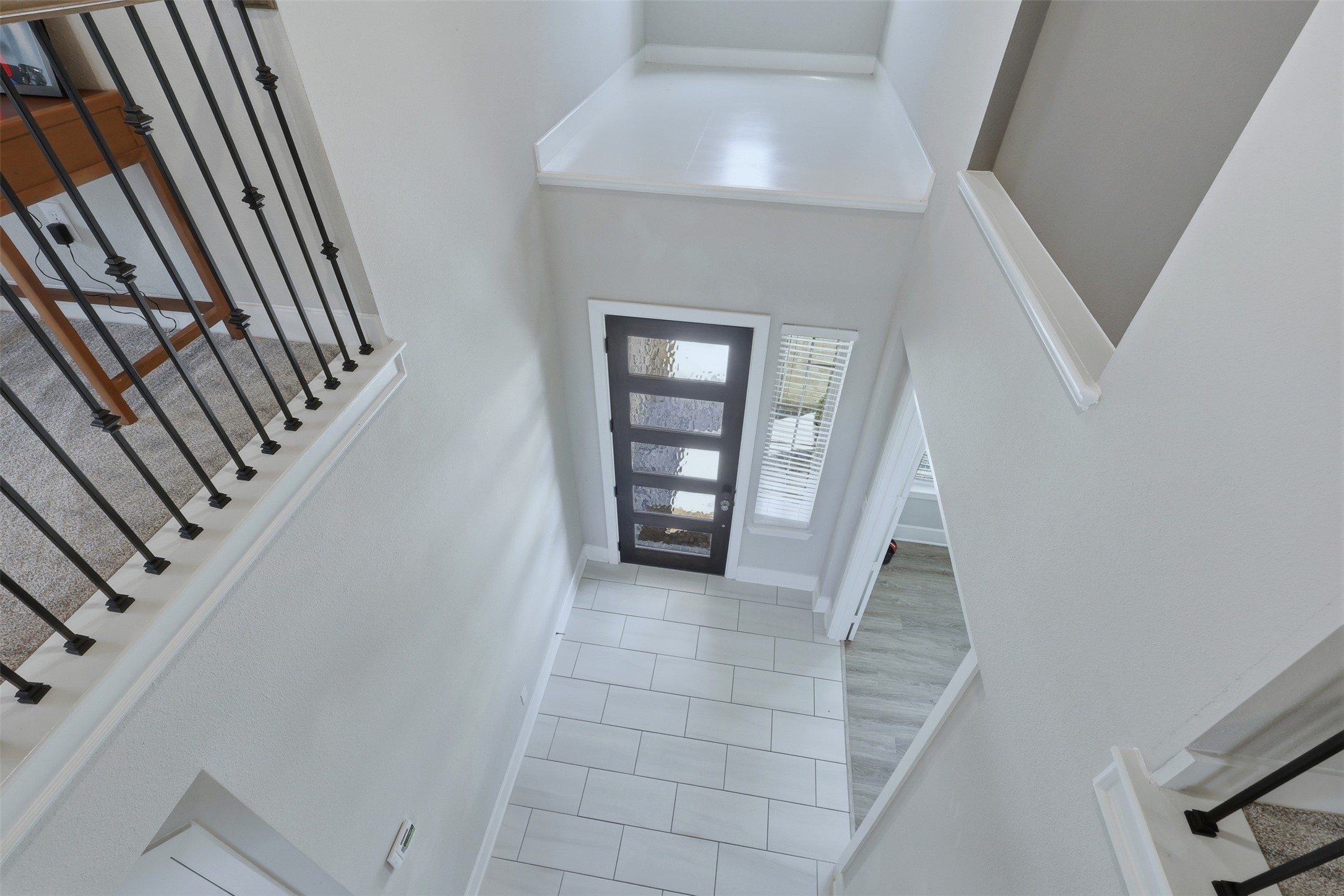 15133 Mahogany Trail Conroe, TX 77302 - Photo 37 of 49 a view of an entryway with staircase