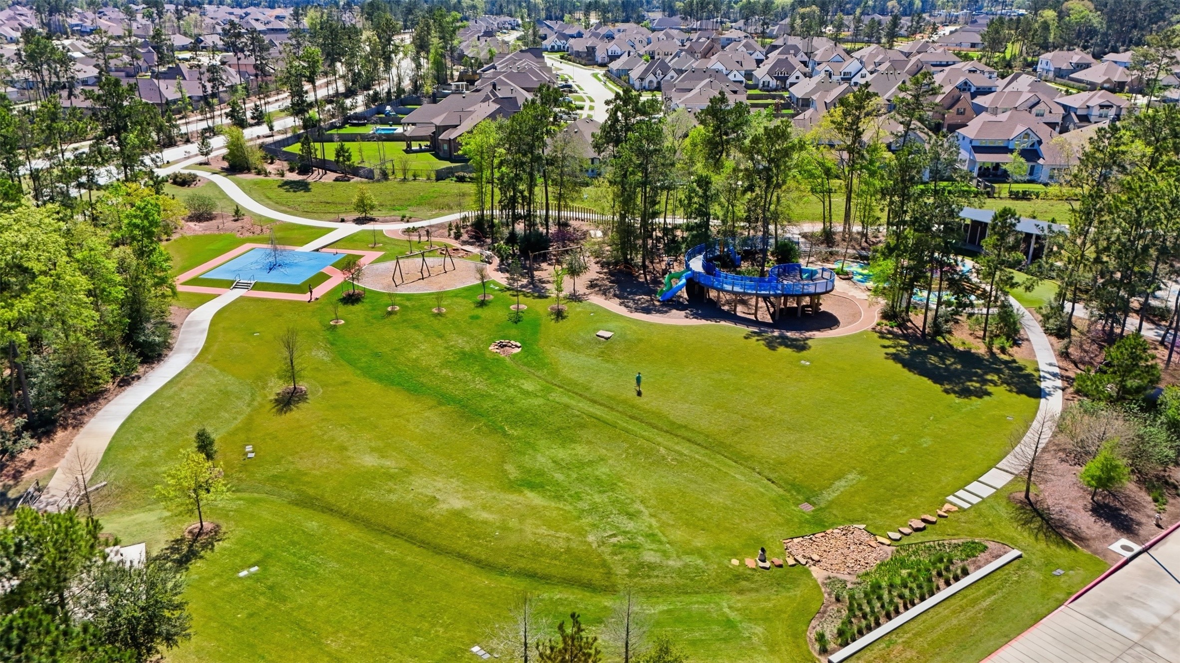 15133 Mahogany Trail Conroe, TX 77302 - Photo 45 of 49 a view of a swimming pool and outdoor seating
