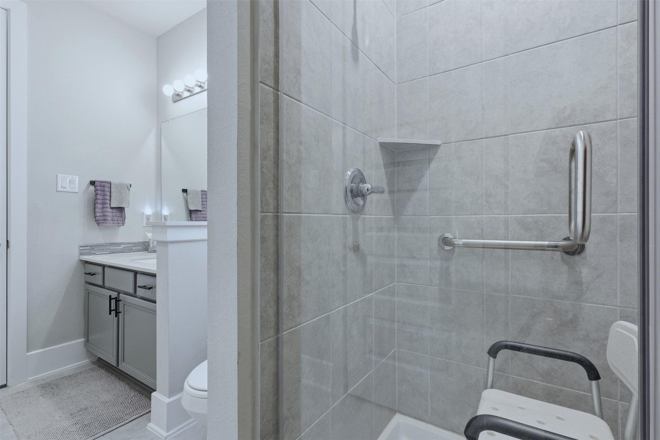 15133 Mahogany Trail Conroe, TX 77302 - Photo 8 of 49 a bathroom with a granite countertop sink toilet and shower