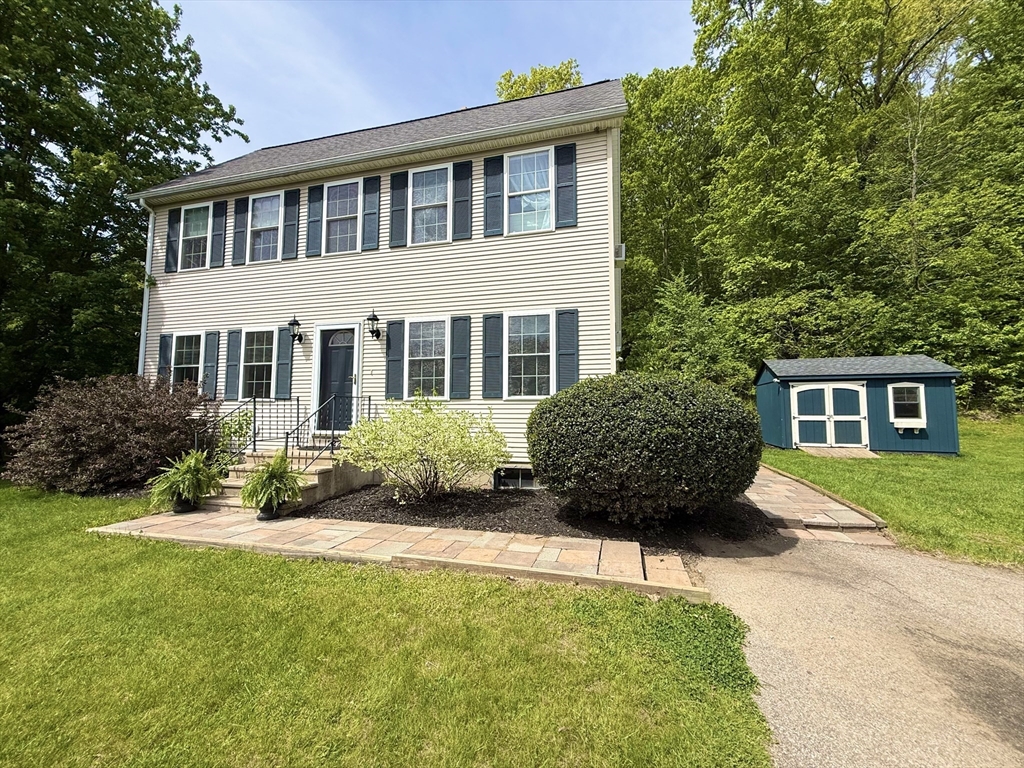 222 Bridge Street Warren, MA 01083 - Photo 3 of 40 a house view with a garden space