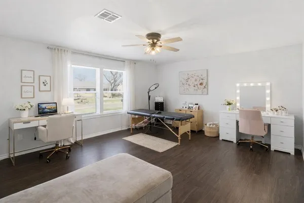 a living room with furniture and a table