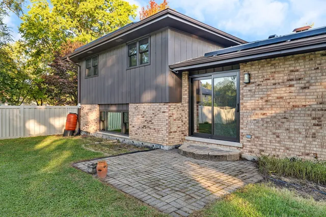 a view of a backyard of the house
