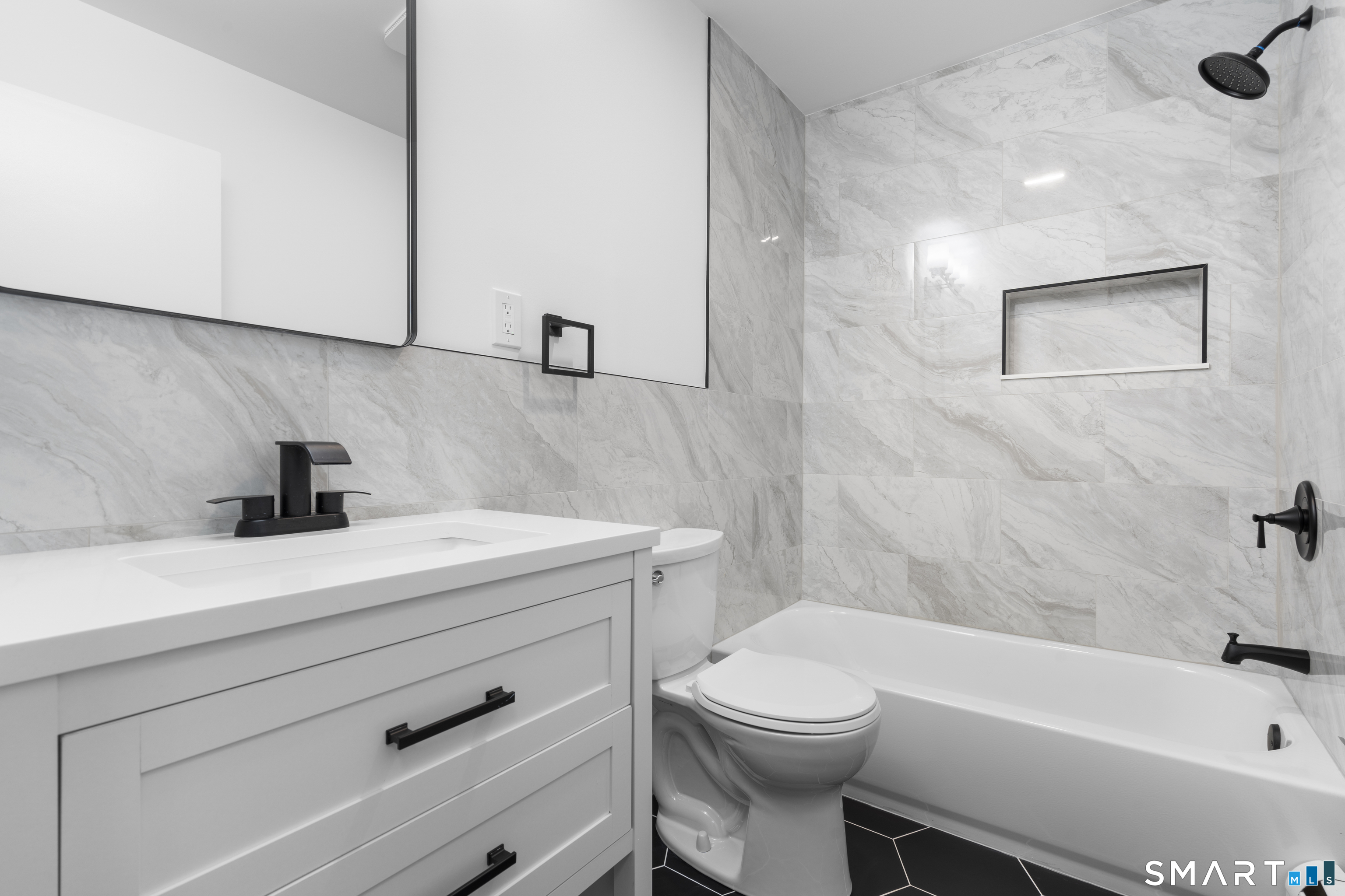 70 Dayton Road Redding, CT 06896 - Photo 9 of 38 a bathroom with a sink a toilet and bathtub