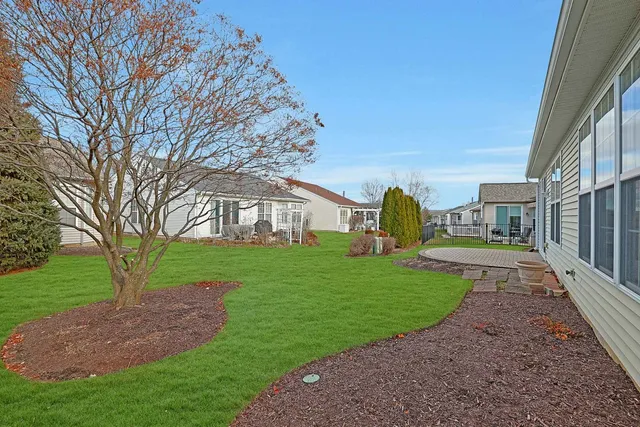 a view of a big yard next to a road