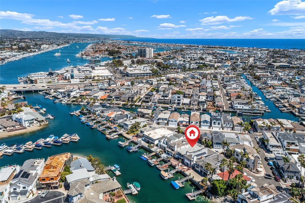 3810 Channel Place Newport Beach, CA 92663 - Photo 2 of 43 an aerial view of city and lake