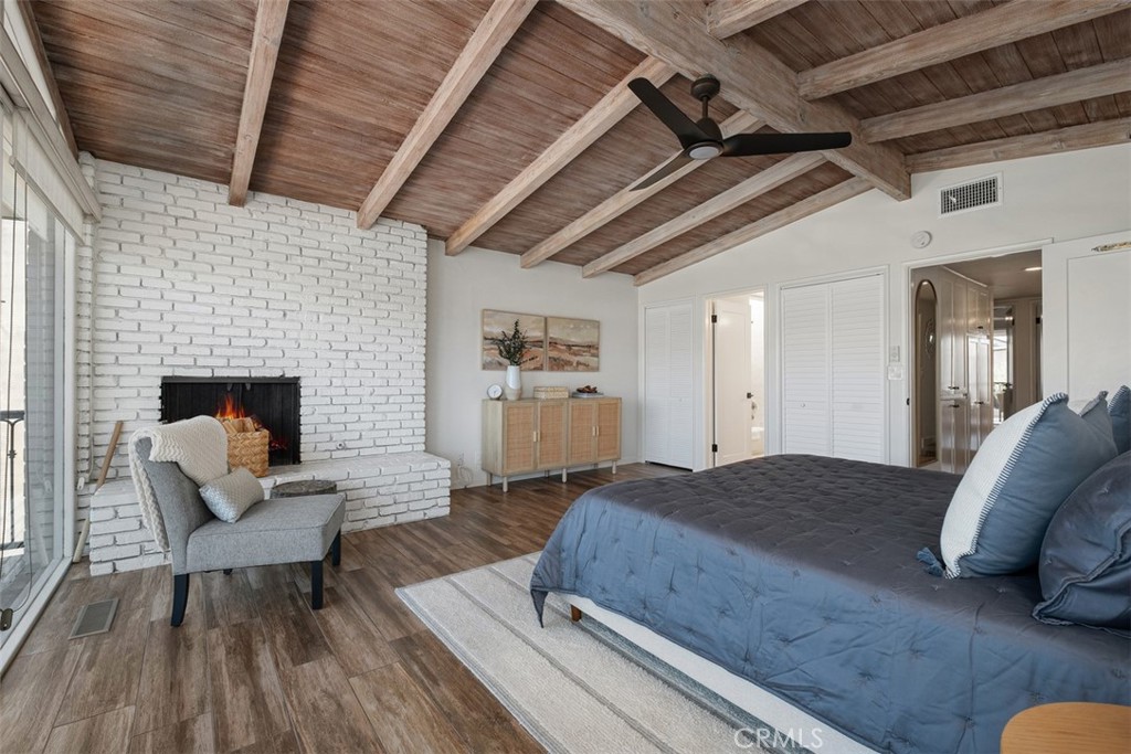 3810 Channel Place Newport Beach, CA 92663 - Photo 27 of 43 a living room with furniture and a fireplace