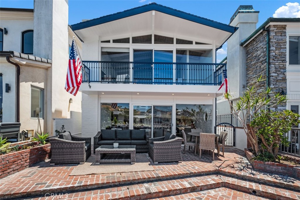 3810 Channel Place Newport Beach, CA 92663 - Photo 3 of 43 a view of a building with a patio