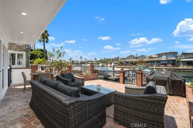 a outdoor living space with patio furniture and a potted plant