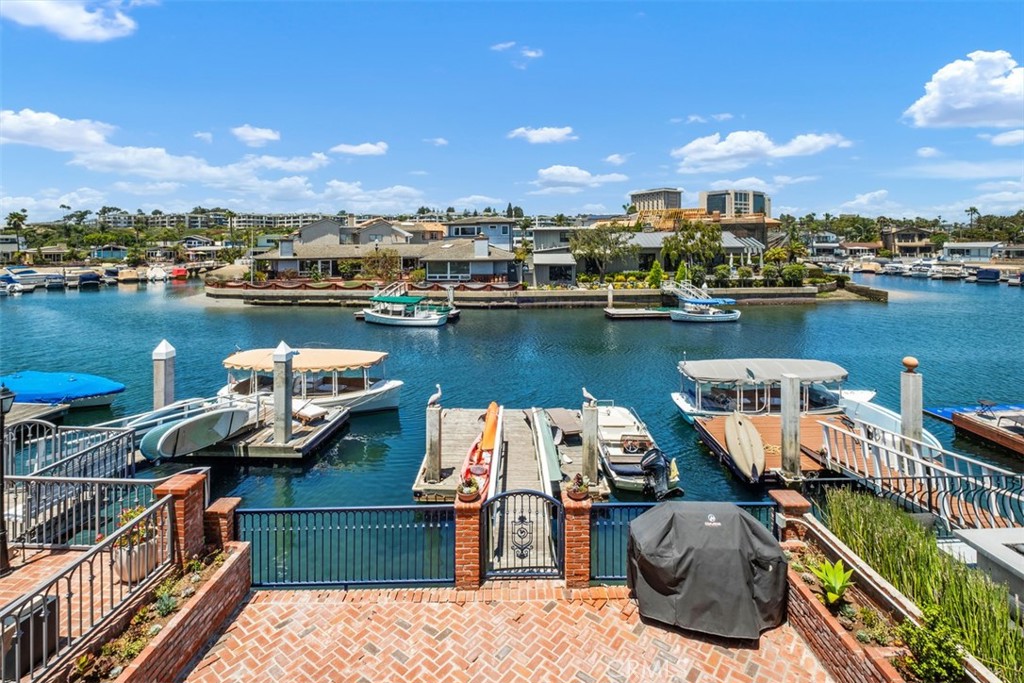 3810 Channel Place Newport Beach, CA 92663 - Photo 42 of 43 a view of a lake with boats and trees