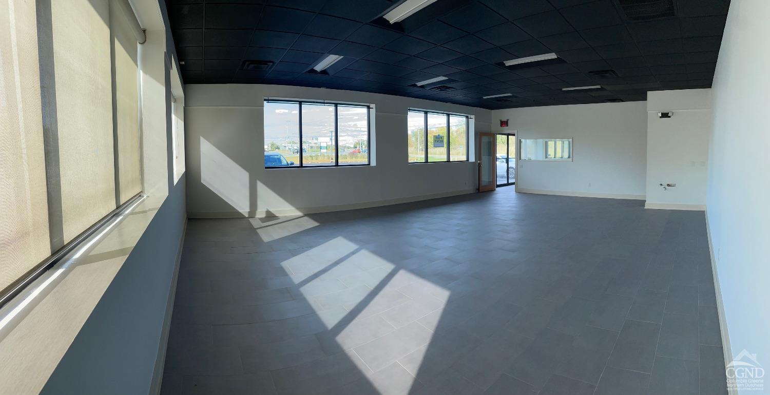 8 County Route 82 Hudson, NY 12534 - Photo 6 of 9 a view of an empty room with wooden floor and a window