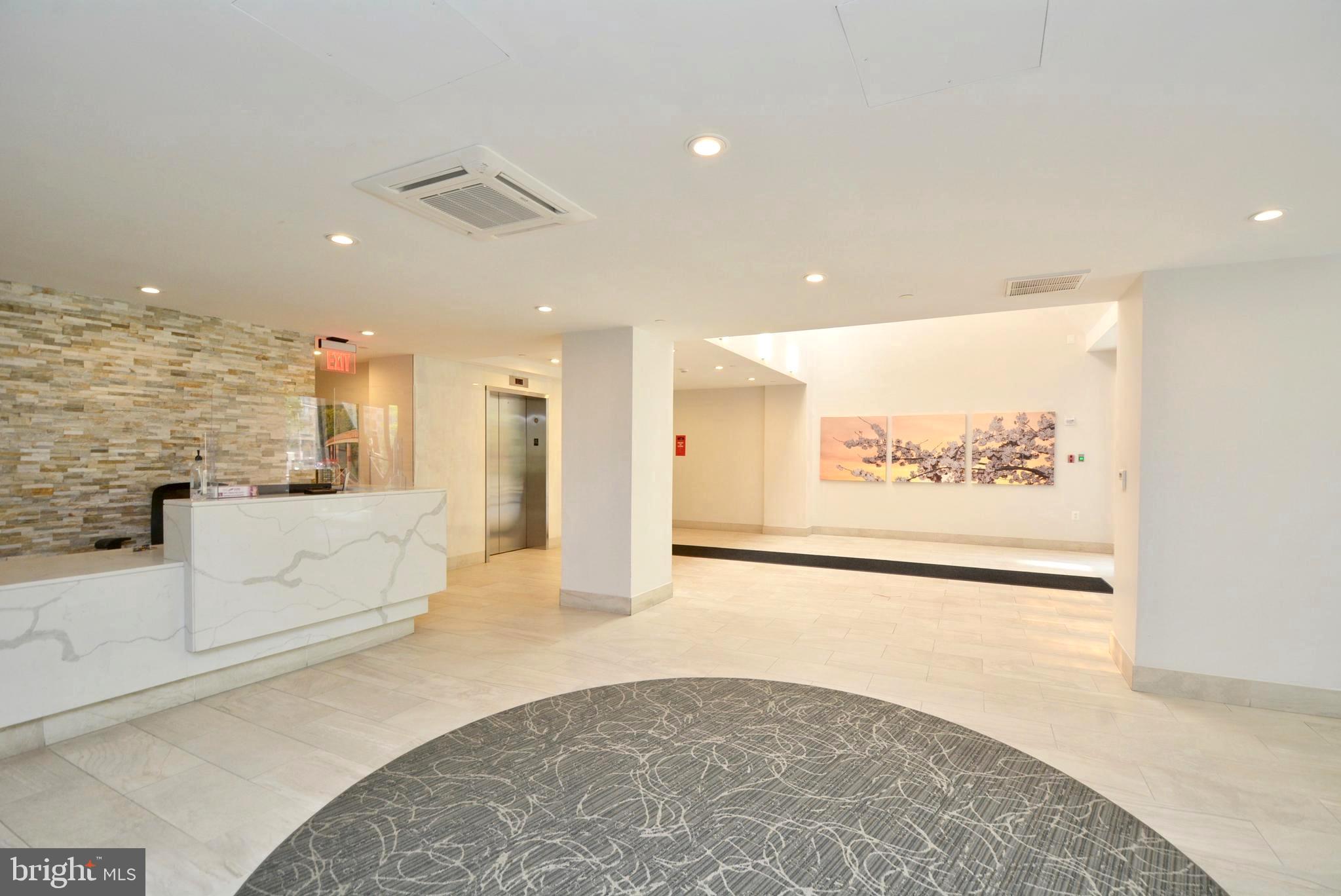 1301 North Courthouse Road, Unit 1512 Arlington, VA 22201 - Photo 6 of 37 Lobby with 24 hour concierge front desk