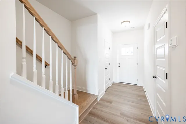 a kitchen with a sink cabinets and window