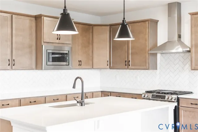 a kitchen with a sink and a stove