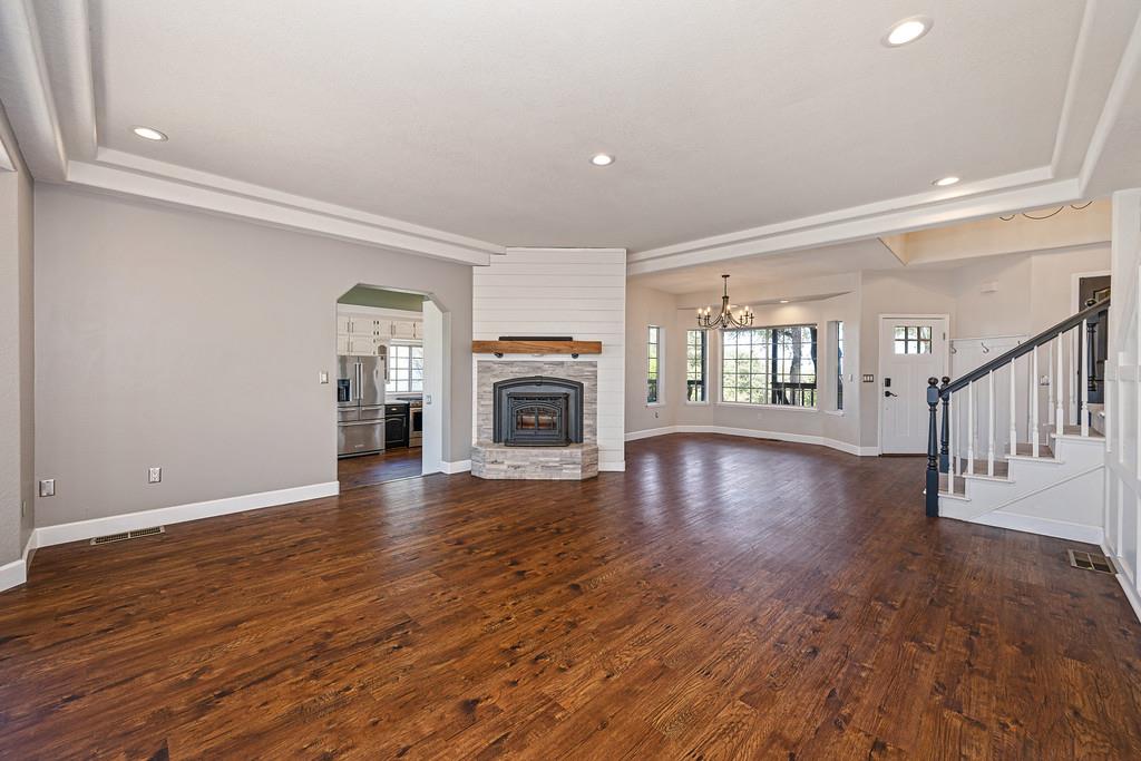 3154 Twin K Road Pilot Hill, CA 95664 - Photo 32 of 89 a view of a livingroom with hardwood floor and a fireplace