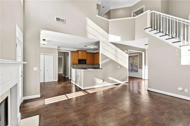 a bathroom with a tub a sink and a shower